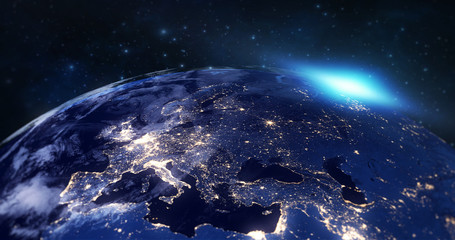 blue planet earth from space showing europe continent at night, globe world with blue glow edge and sun light sunrise, some elements of this image furnished by NASA