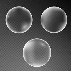 Set of realistic soap water bubbles isolated on transparent background. Vector illustration.