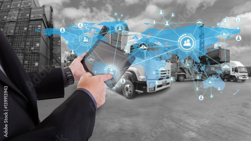 Fotografía hand presses on world map with social media,Truck with Industrial Container Carg