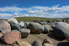 Rocks And Boulders On Hill With Blue Sky