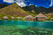 Tropical resort with over water bungalows on Moorea Island