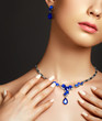 © looking2thesky - Beautiful woman with a sapphire necklace. Fashion concept