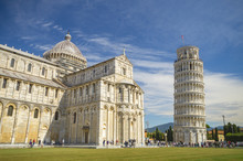 Piazza Dei Miracoli, With The Basilica And The Leaning Tower. Pisa, Italy.
