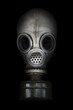 Old gas mask on a black background