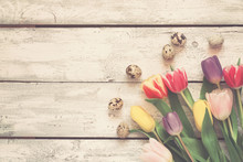 White Wooden Easter Background With Tulips And Eggs, Toned
