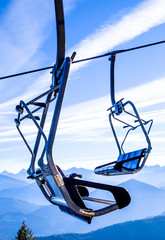 Canvas Print - ski lift chairs