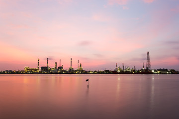 Sticker - Oil refinery industry plant along twilight morning,Beautiful light.