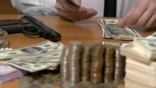 A Man Counts Money.