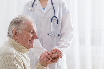 elderly man with doctor