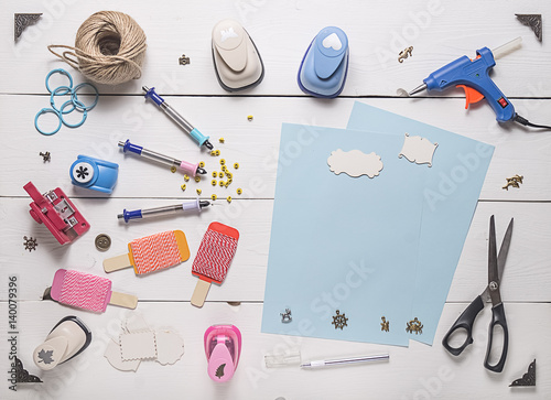 Cuadros en Lienzo top view of wooden table with tools for scrapbooking
