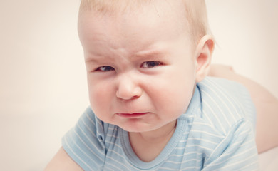 eight month old baby crying