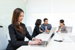 © leungchopan - Business people discussing and working together during a meeting in office