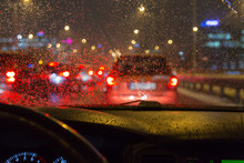 Driving A Car In A Bad Weather, In Traffic Jam