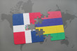 puzzle with the national flag of dominican republic and mauritius on a world map