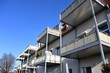 canvas print picture - Moderne Balkone mit Edelstahl-Geländer an Hausfront