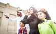 © oneinchpunch - Traditional arabian family walking in the old town