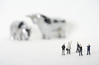 © STOCK4B  - Group of businessmen figurines standing in front of bull and bear