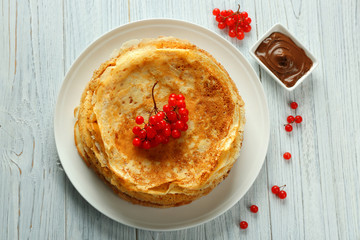 Sticker - Delicious pancakes decorated with viburnum on plate