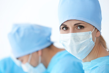 Wall Mural - Portrait of beautiful young doctor in clinic