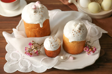 Wall Mural - Plate with sweet Easter cakes on table