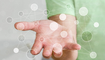 Wall Mural - Businessman holding digital data network in his hand 3D rendering