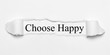 Choose Happy on white torn paper