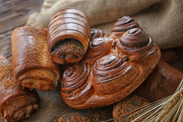 Wall Mural - Bakery products on sackcloth, closeup