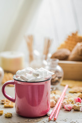 Wall Mural - a delicious Cup of cocoa with marshmallows and straws