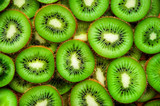 Juicy green round pieces of kiwi on the surface