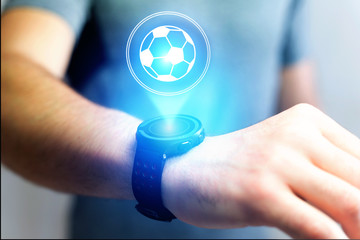 Soccer ball icon over device - Sport and technology concept