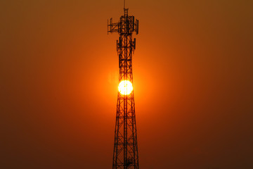 Mobile phone transmitter in the evening, the sun is down, and inside the transmission tower.