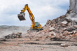 © Monika Gruszewicz - Excavator working at the demolition of an old industrial buildin