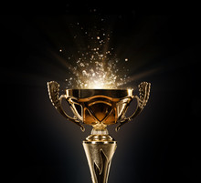 Champion Golden Trophy On Black Background