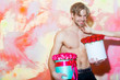 © Volodymyr - bearded muscular man with sexy body holds red rose box