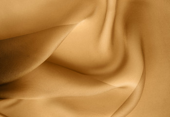 Wall Mural - abstract background of golden fabric folds