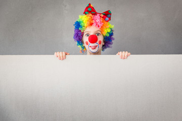 Wall Mural - Funny kid clown playing indoor