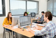 © W PRODUCTION - group of young cool hipster business people in casual wear working together in open space room of a startup company