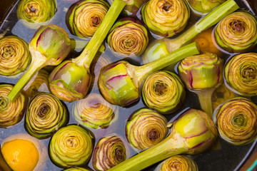 artichokes in water at roman market