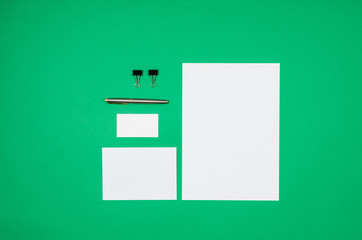 Poster - Mock-up magazine or catalog on colorful table. White page or notepad on modern background. Blank copy space for mockups or simulations.