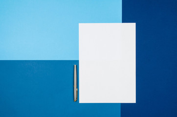 Poster - Mock-up magazine or catalog on colorful table. White page or notepad on modern background. Blank copy space for mockups or simulations.