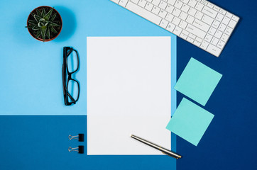 Leinwandbilder - Mock-up magazine or catalog on colorful table. White page or notepad on modern background. Blank copy space for mockups or simulations.