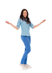 Poster - full body picture of a young casual woman welcoming you