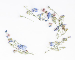 Flowers composition. Frame made of dried flowers on white background. Flat lay, top view