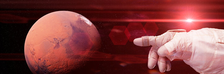 Wall Mural - astronaut pointing to mars