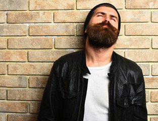 Bearded brutal caucasian hipster in glasses