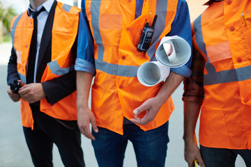 Sticker - Three builders or architects in uniform standing in row