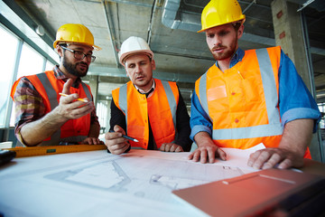 Sticker - Supervisors discussing sketch of building