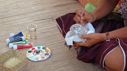 Canvas Print - Local Artist Finishes Decorating Ostrich Egg at Taman Nusa Cultural Park