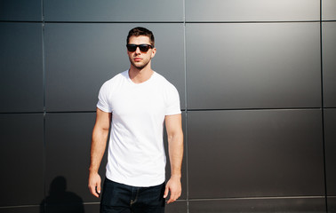 Wall Mural - White shirt on a man for your logo