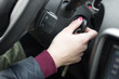 © yanik88 - Closeup inside vehicle of hand holding key in ignition, start engine key
